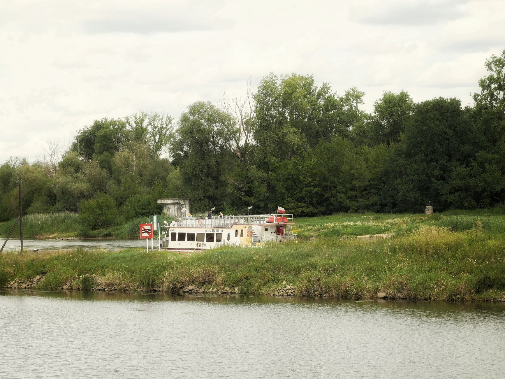 Boat navigating Ohio River channel