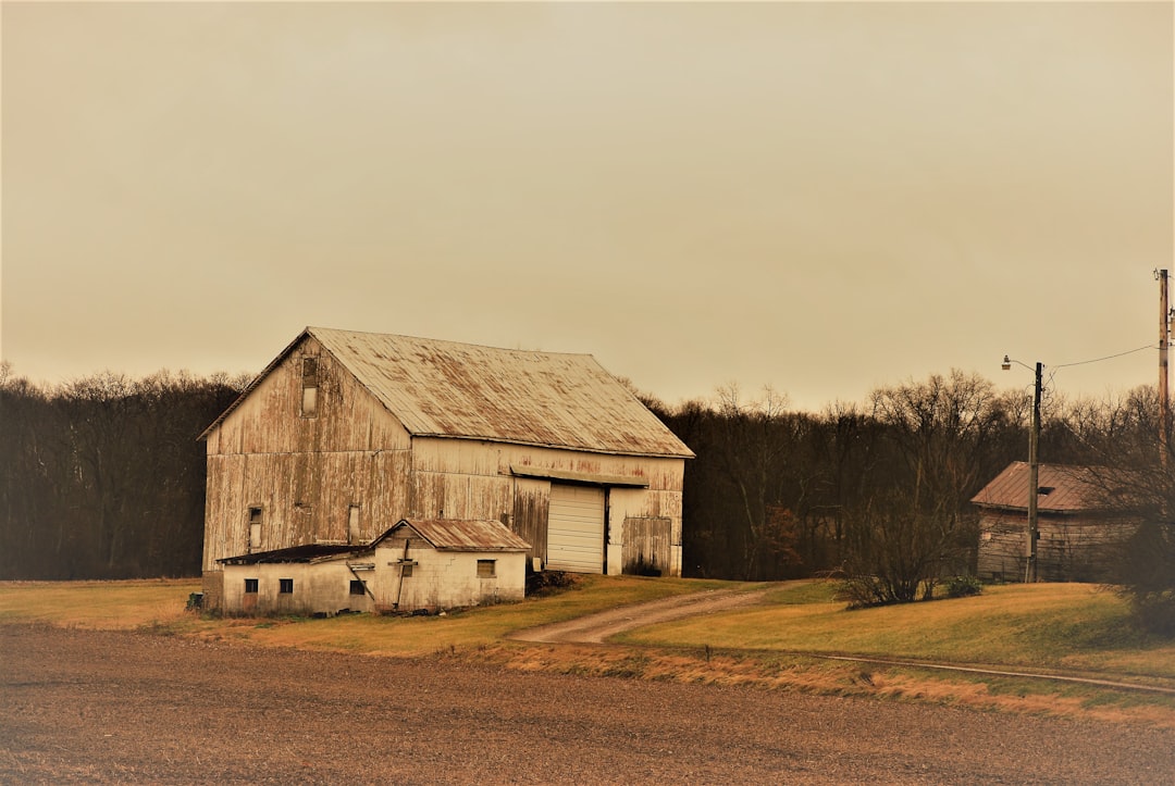 Ohio rural highway representing driving conditions that affect car insurance rates in Ross County