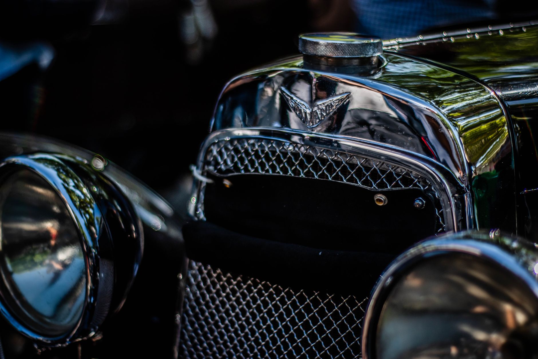 Shiny chrome vintage automobile at car show