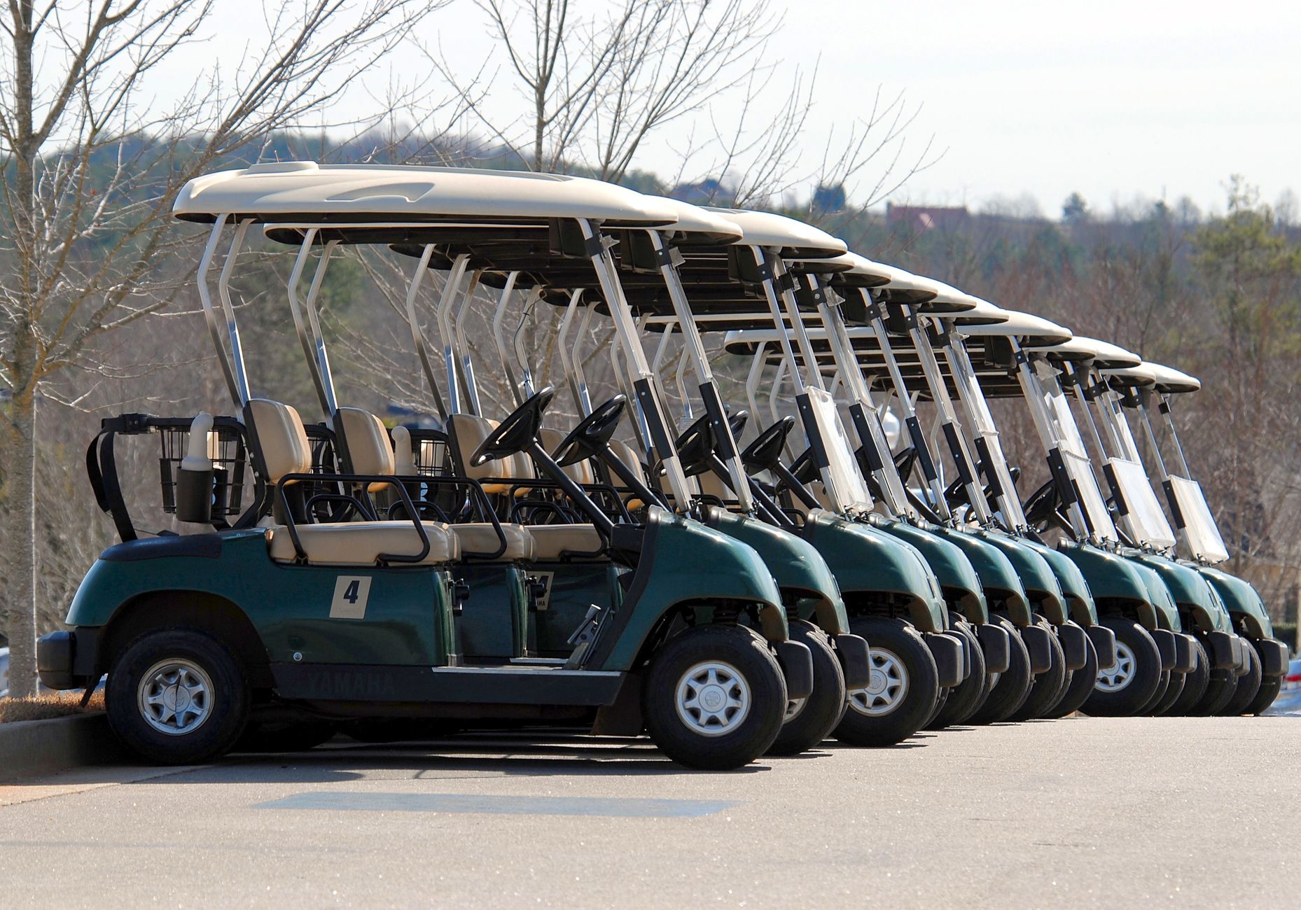 Golf cart parked on green course in Ohio