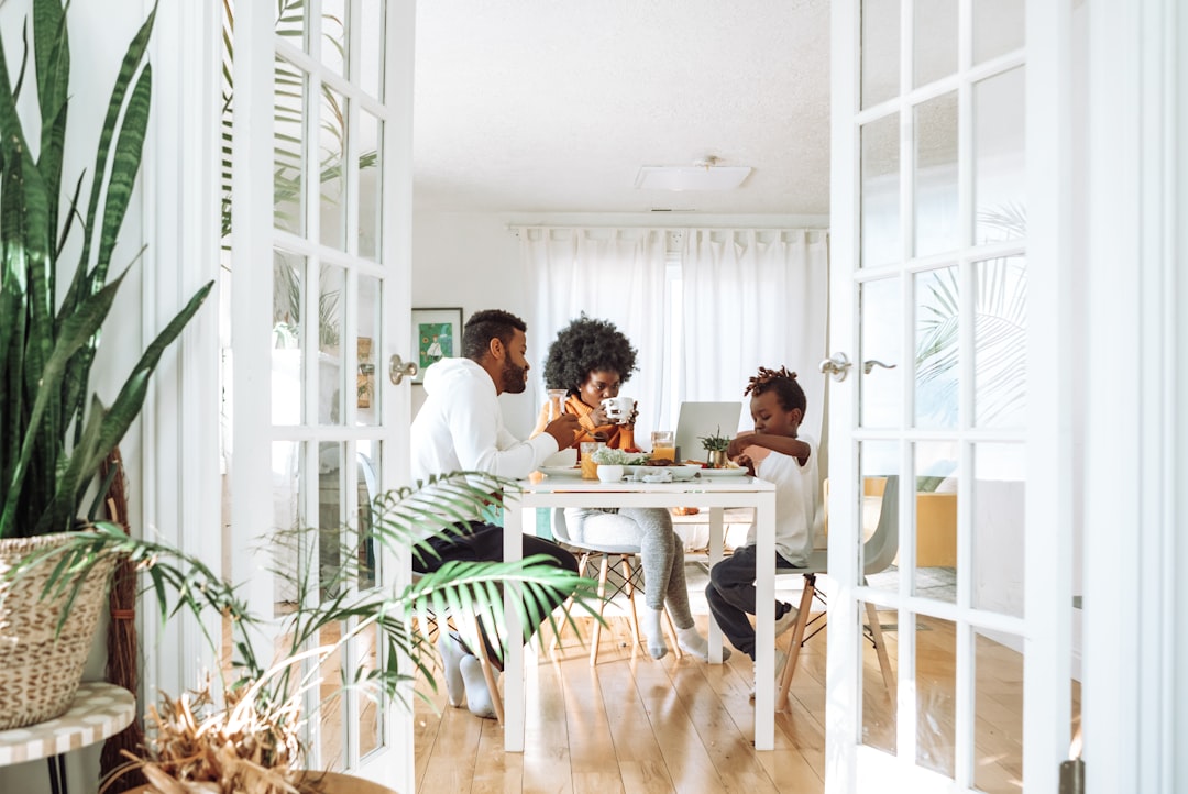 Homeowners insurance agent meeting family