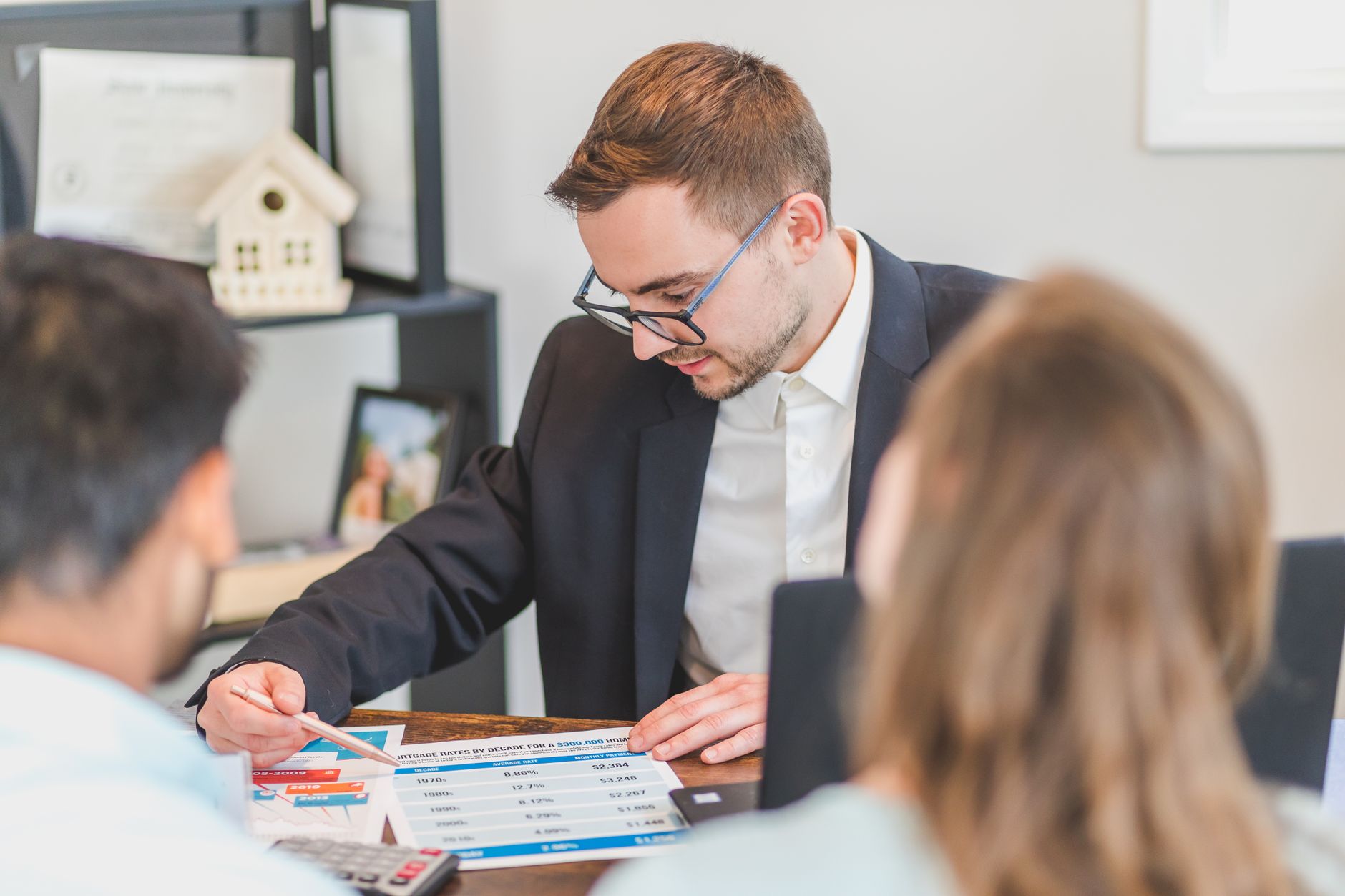 Ohio insurance agent comparing quotes with customer