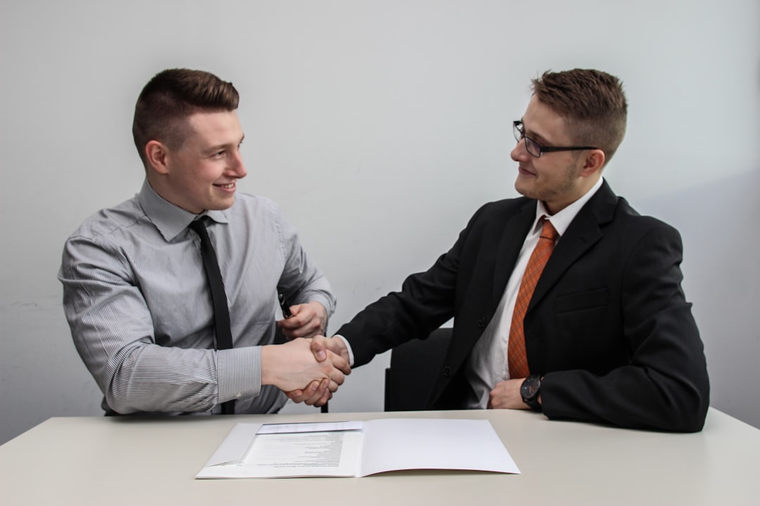 Insurance agent consulting with a client about coverage options at the Portsmouth Ohio office