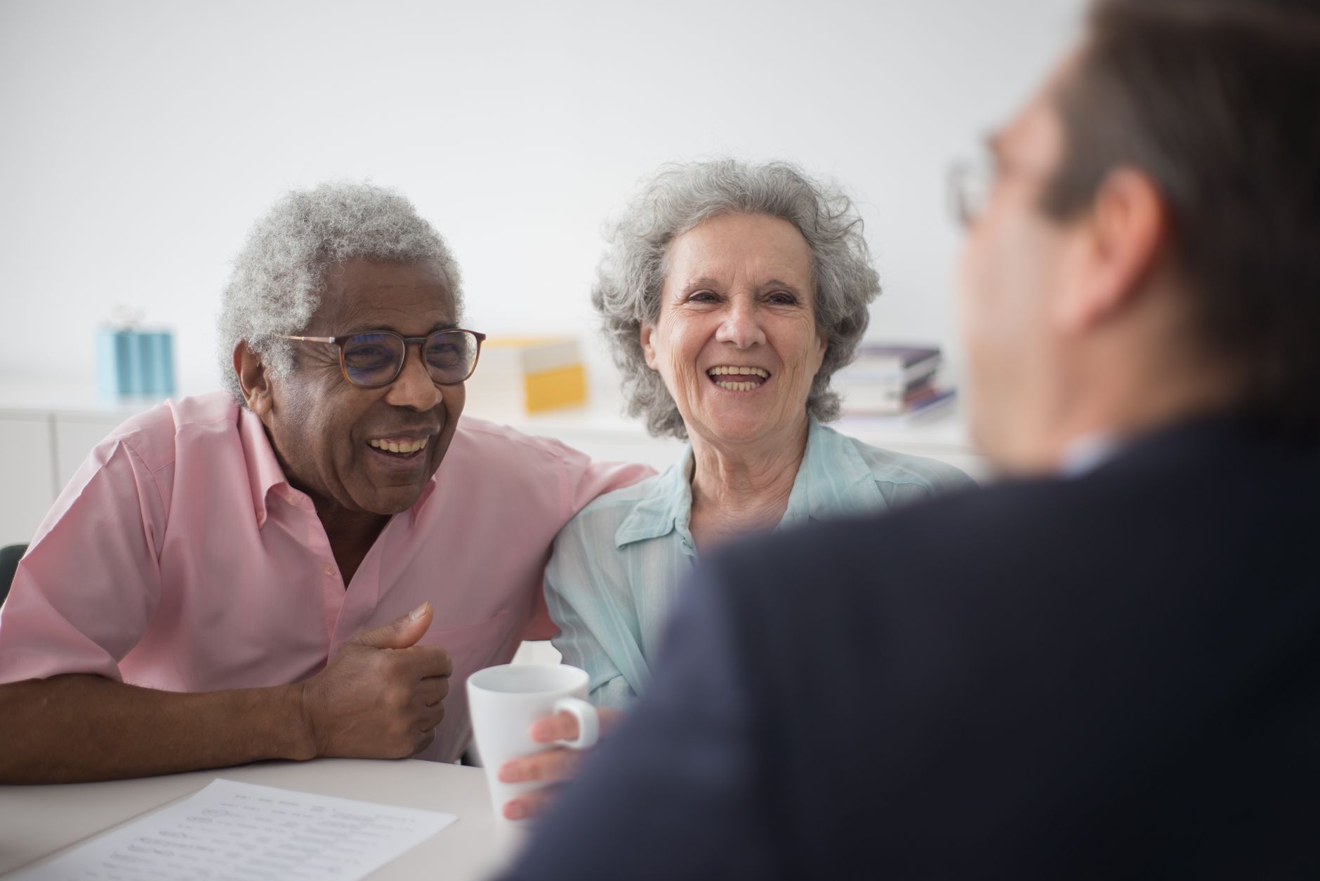 Ohio retiree couple reviewing insurance and financial planning