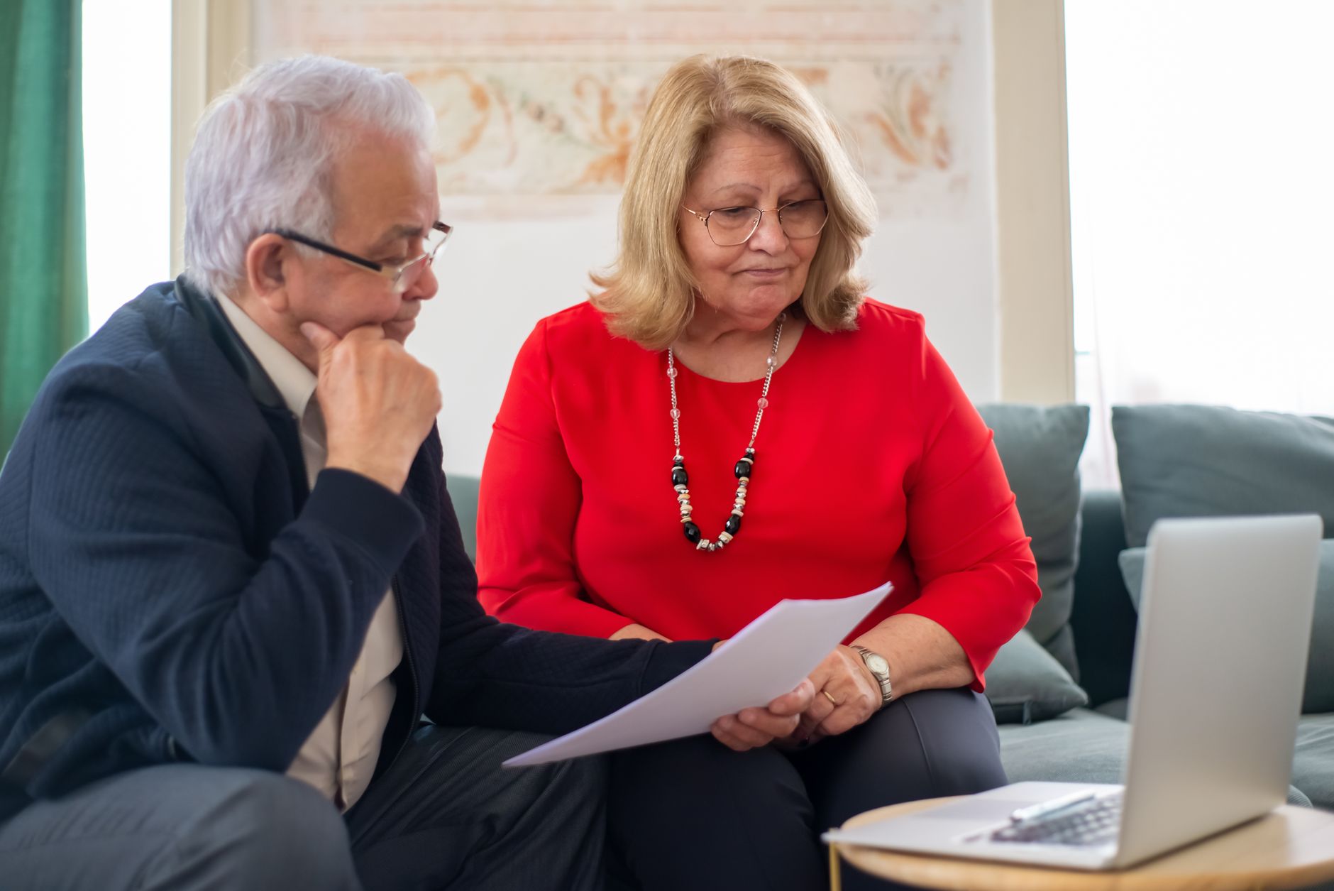 Senior Ohio couple reviewing insurance during retirement