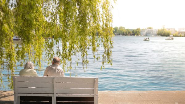 Ohio retirees relaxing outdoors while planning their insurance coverage for retirement