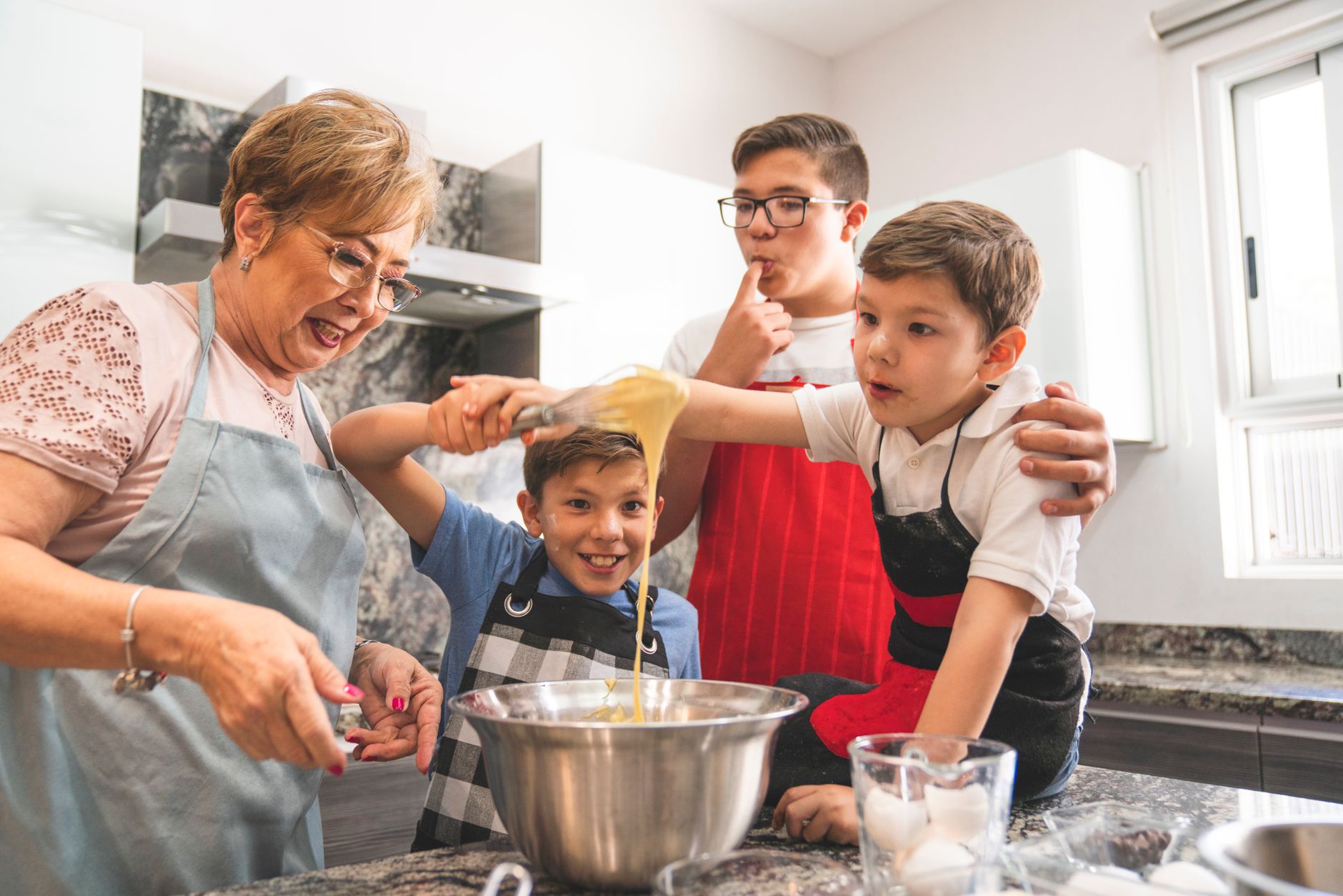 Grandmother with grandchildren representing Ohio grandparent life insurance
