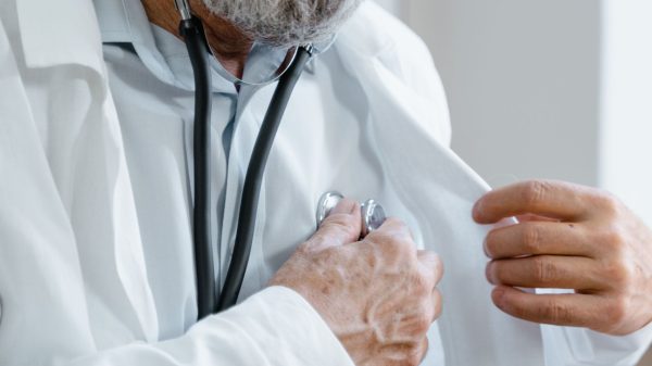 Ohio senior meeting with doctor to discuss Medicaid planning and health insurance options