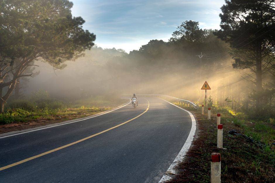 Motorcycle rider on Ohio highway countryside road