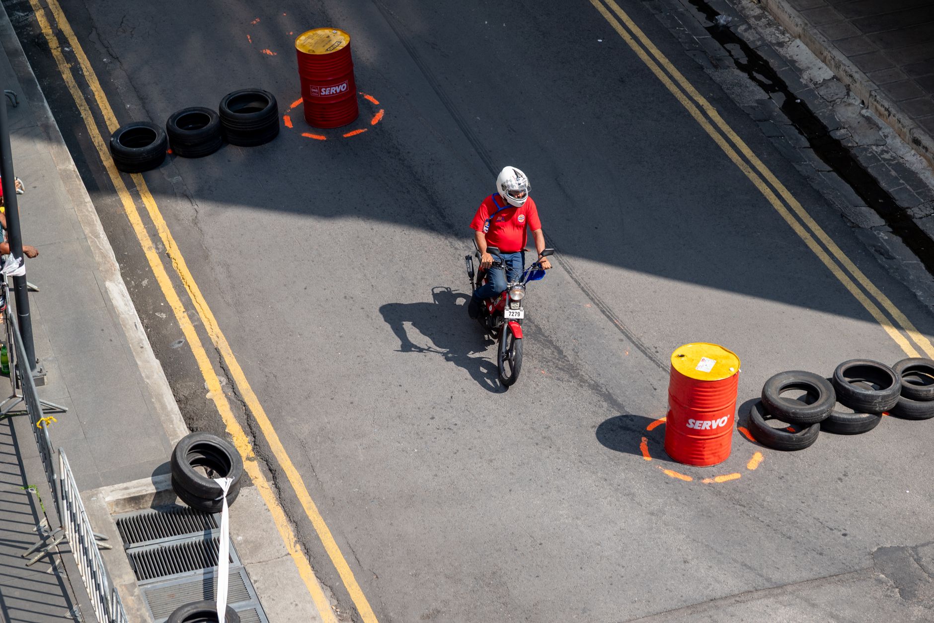 Motorcycle rider practicing safety course maneuvers