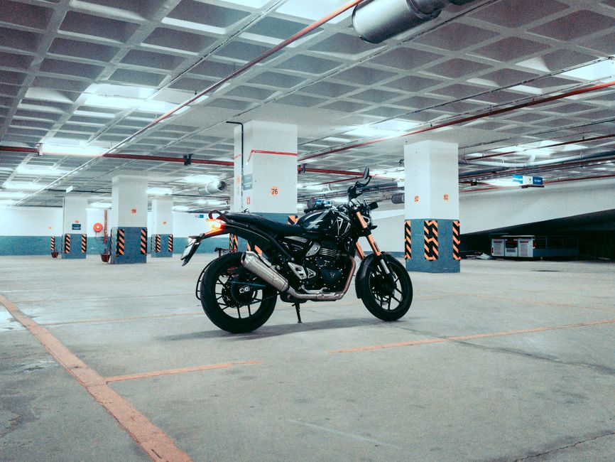 Motorcycle stored in garage during Ohio winter — seasonal coverage options for off-season protection