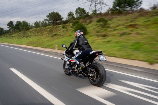 Ohio motorcycle rider with minimum liability insurance — 25/50/25 required by Ohio law