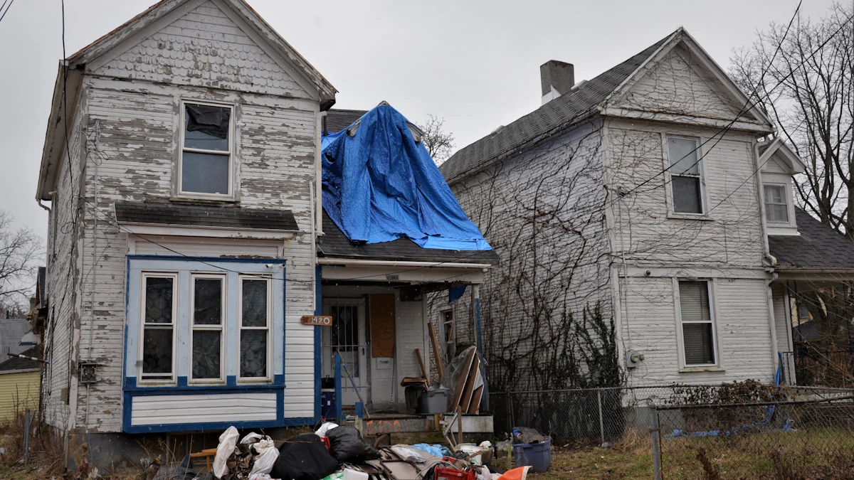 Ohio home with storm damage — emergency tarp on roof after hail for State Farm homeowners claim