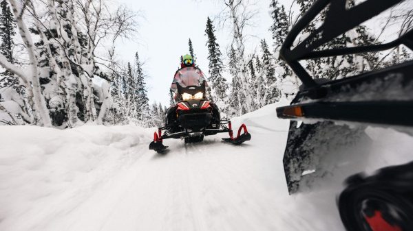 snowmobile frozen lake trail