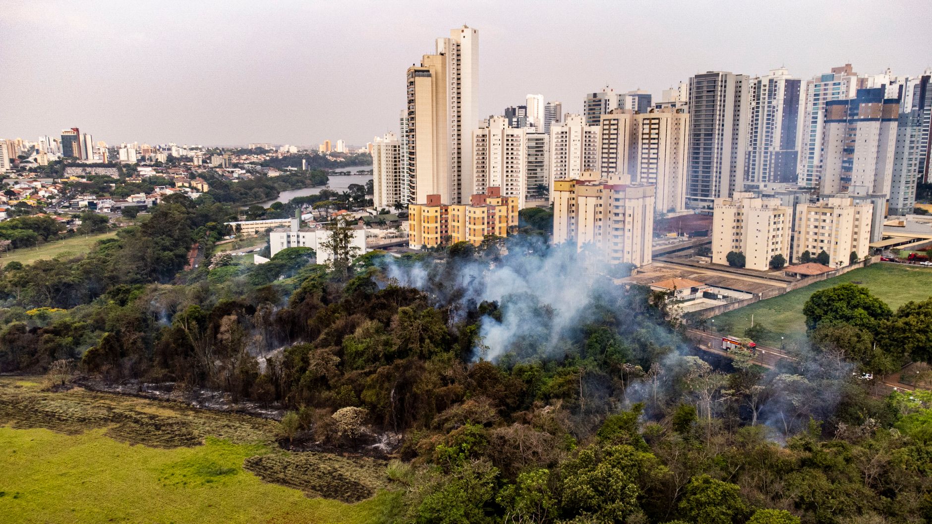 Smoke rising from a fire near city high-rises