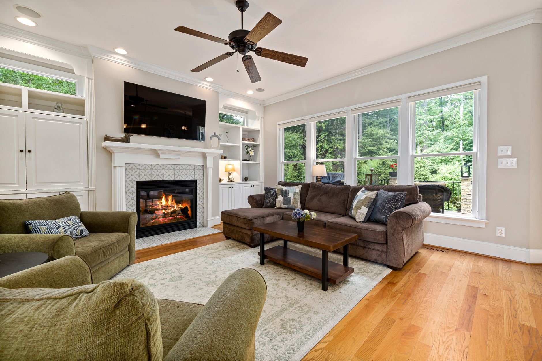 An area rug under a coffee table in a living room