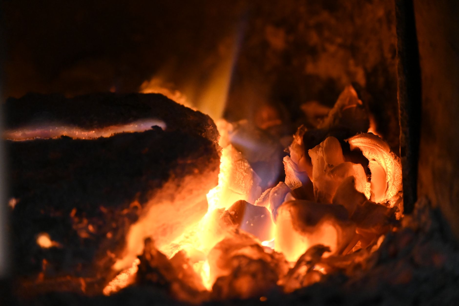 Embers glowing in a stove