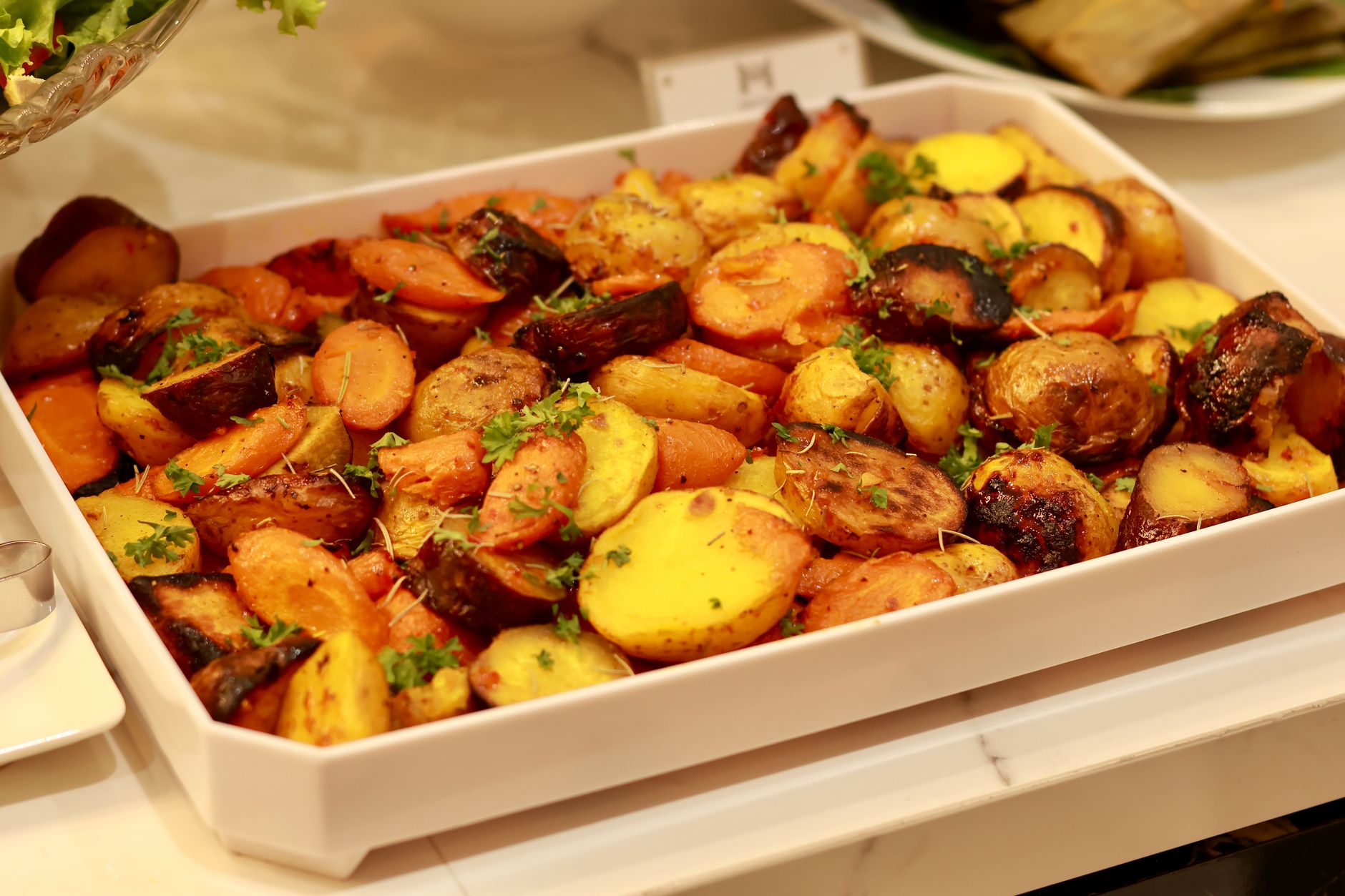 A tray of roasted potatoes