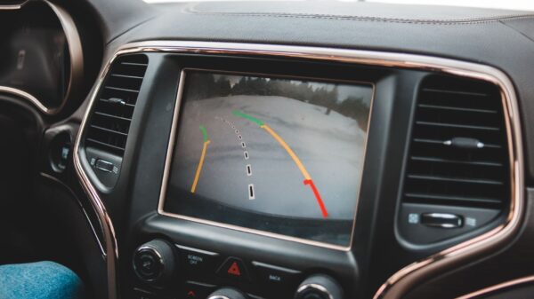 A rear camera view with guide lines on a car screen