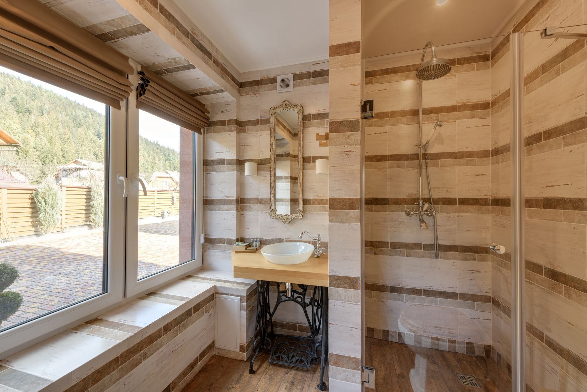 A bright bathroom with a large window