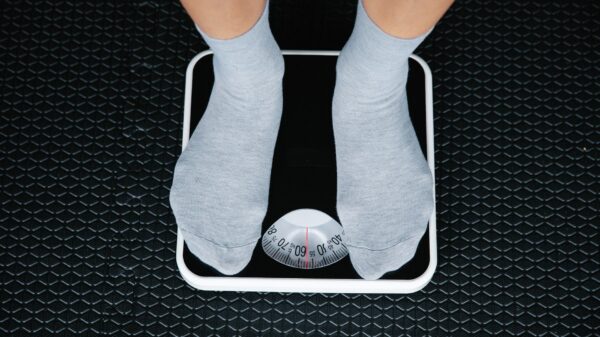 Best bathroom scale: feet in socks on a dial scale
