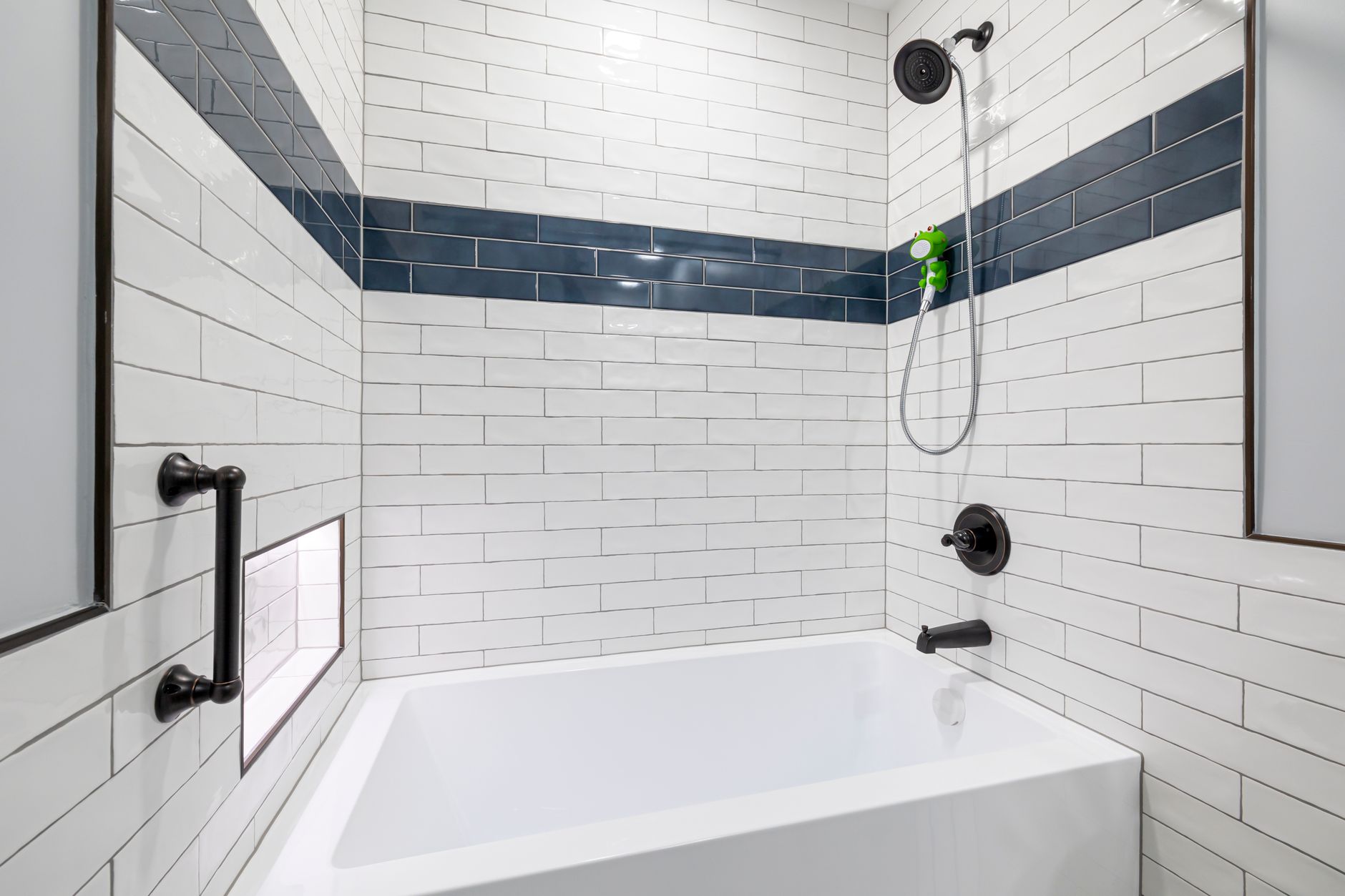 A tiled tub and shower