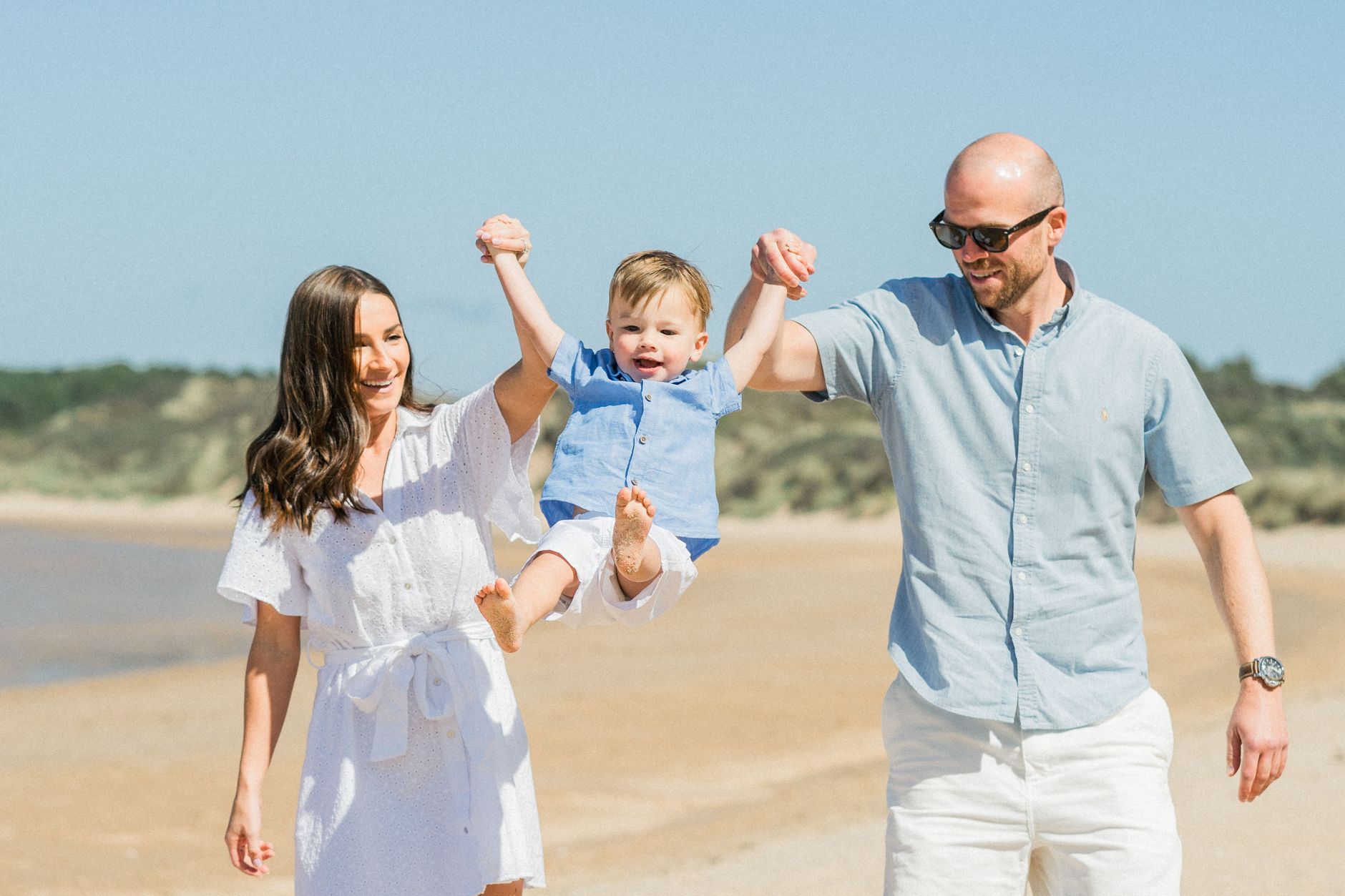 A family spending a sunny day at the beach