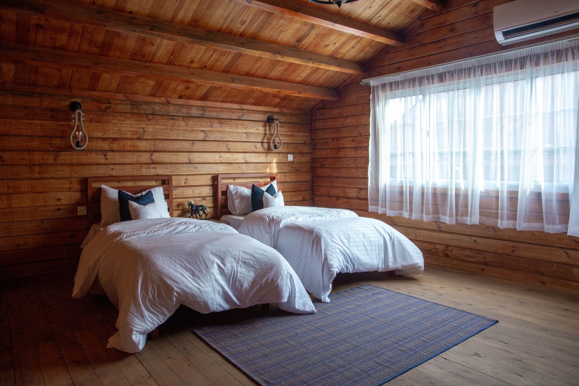 A wooden bed in a bedroom