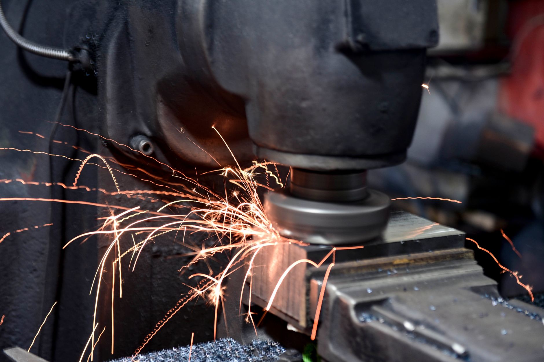 Sparks from metalworking in a workshop