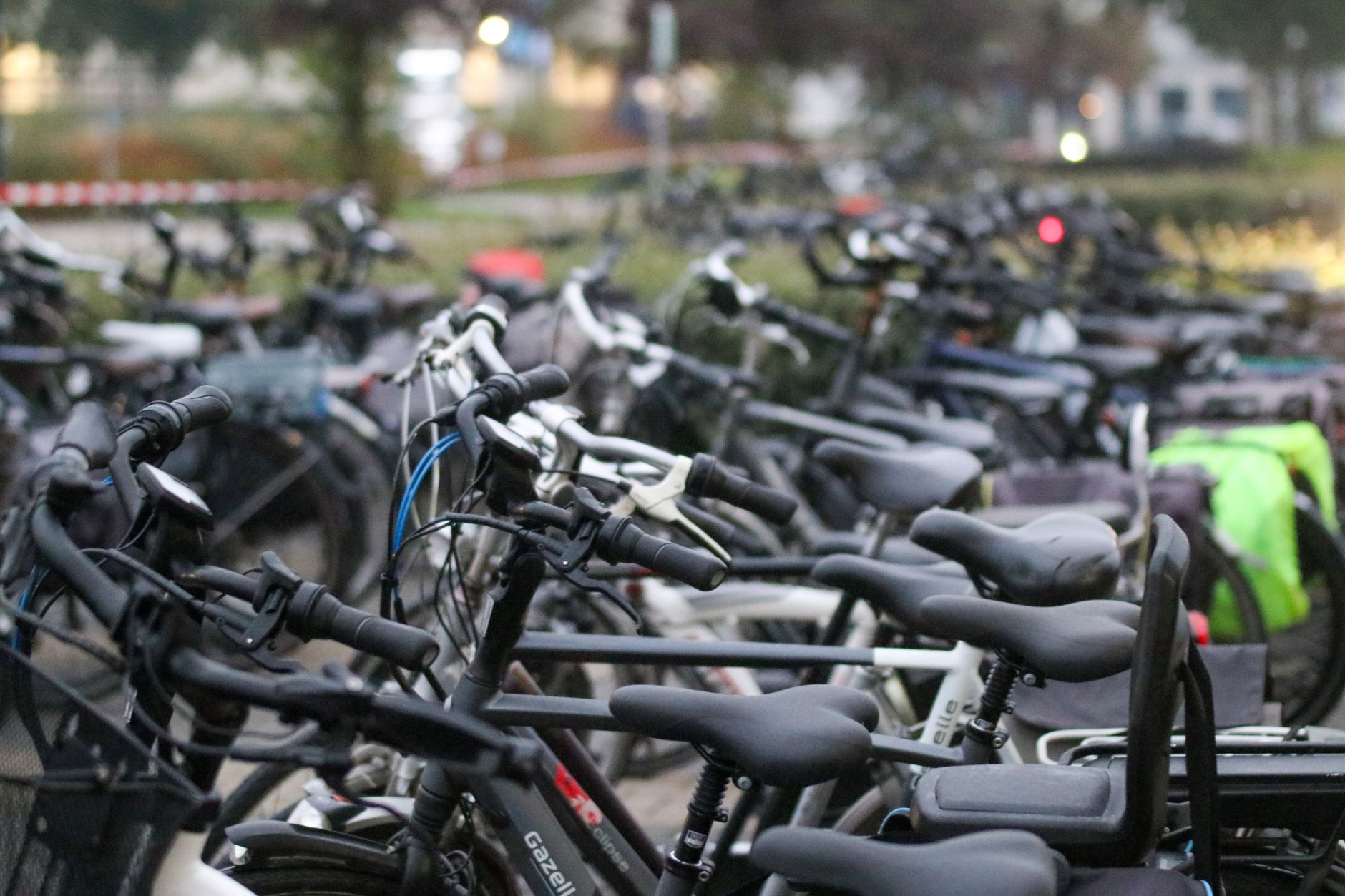 A bicycle commuter riding through a city street