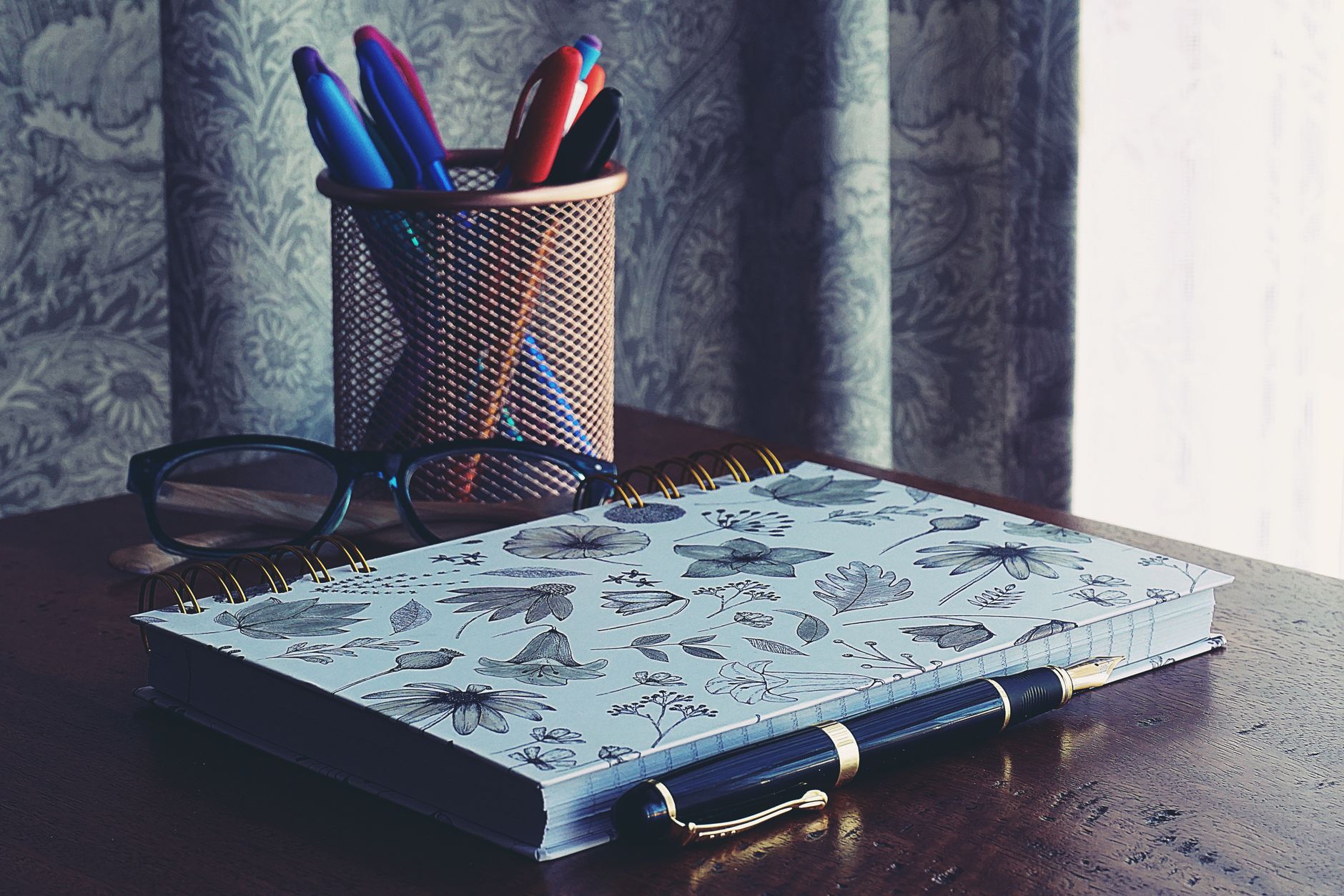 Books and supplies on a home desk