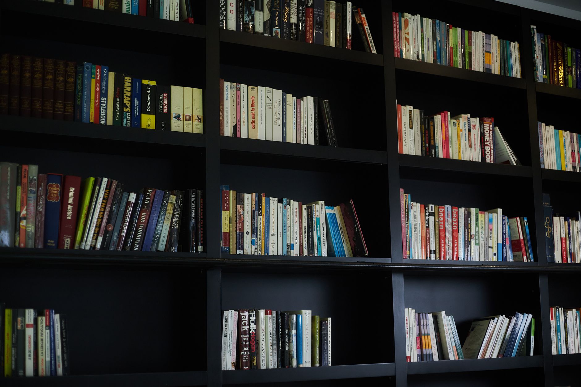 A bookcase in a home office