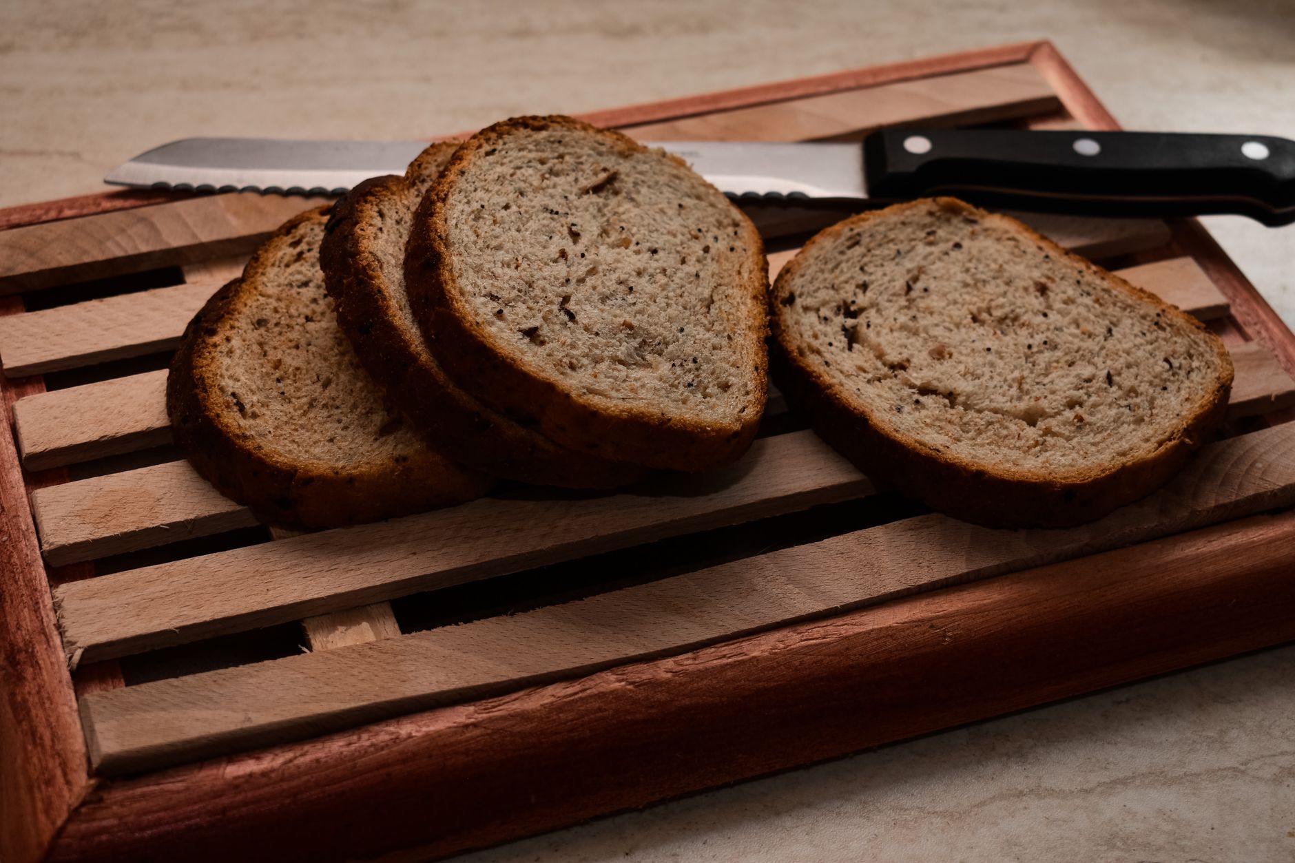 Sliced bread on a wooden board