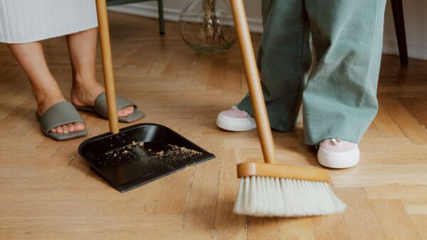 Sweeping crumbs into a dustpan