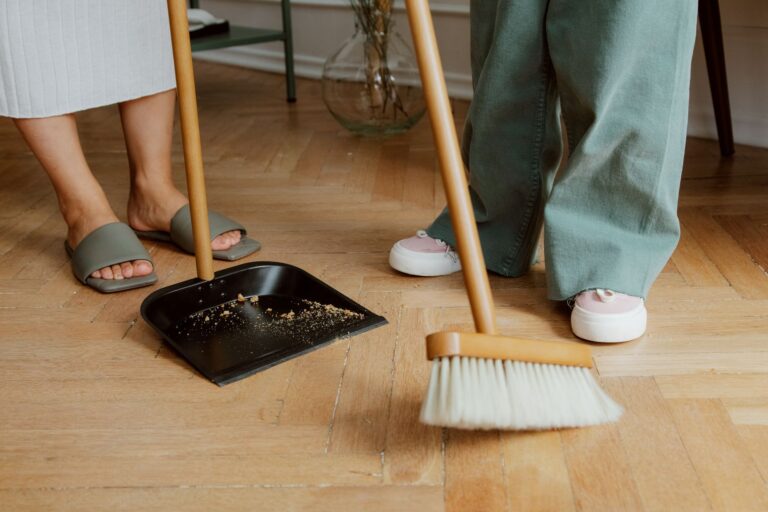 Sweeping crumbs into a dustpan