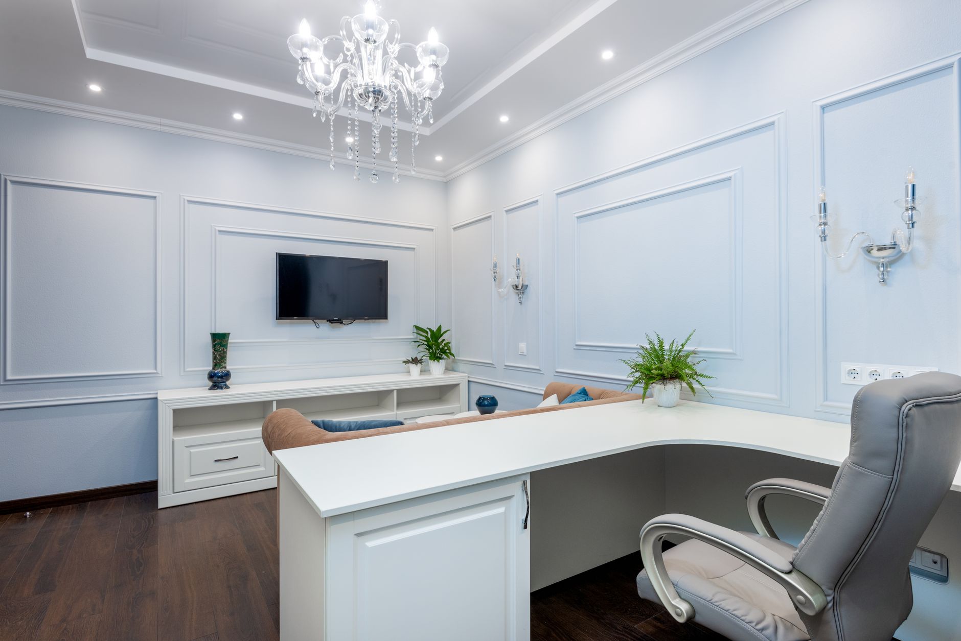 A tidy home office wall above a desk