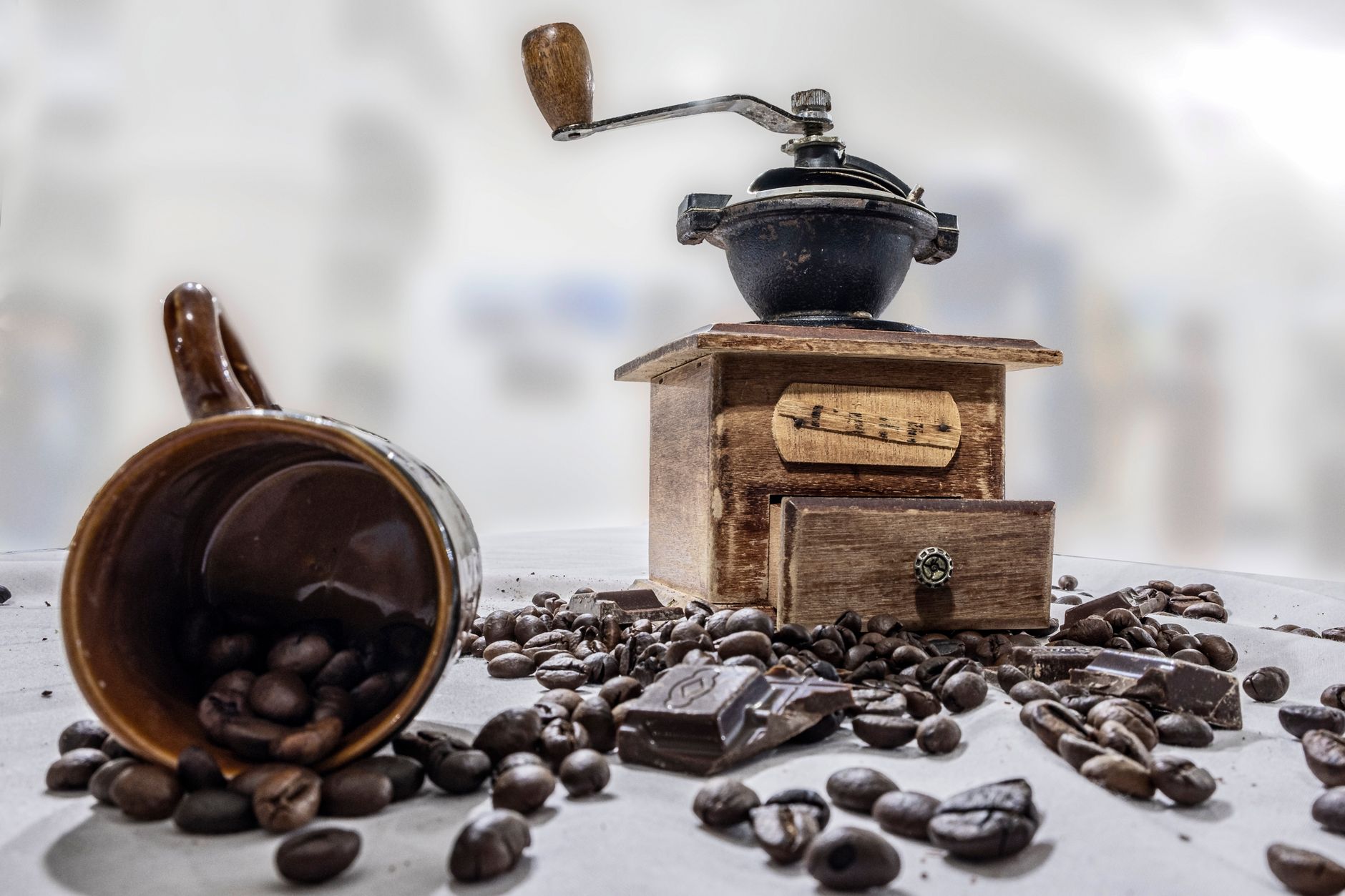 Best burr grinder: a vintage manual coffee grinder with whole beans