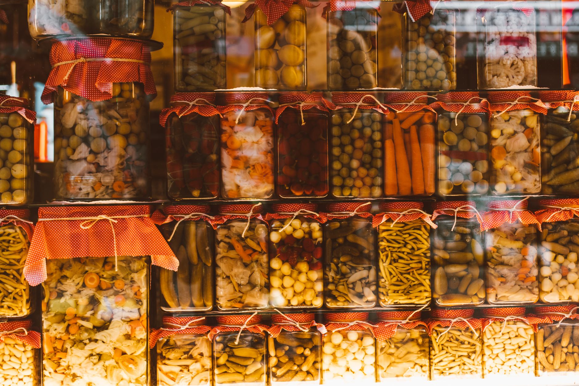 Shelves of preserved food in glass jars