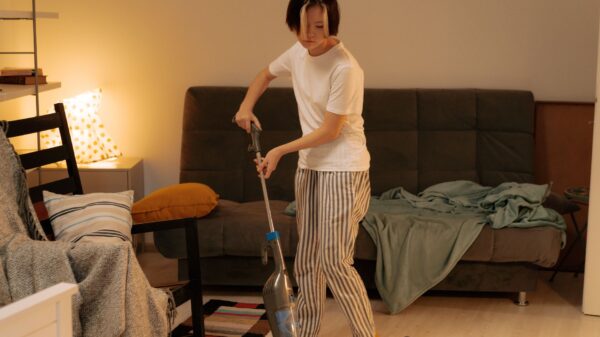 Best canister vacuum: vacuuming a living room floor