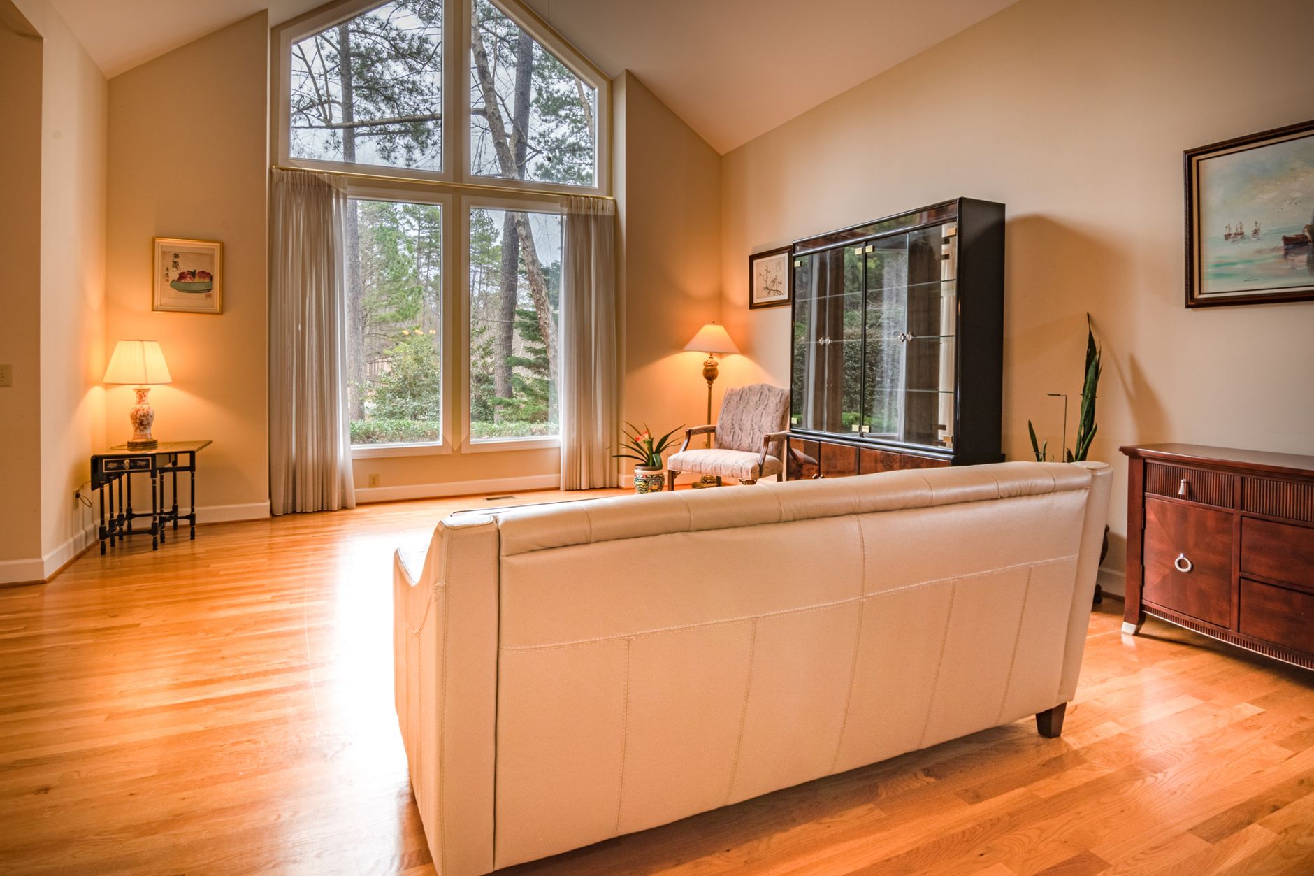 A living room with hardwood floors