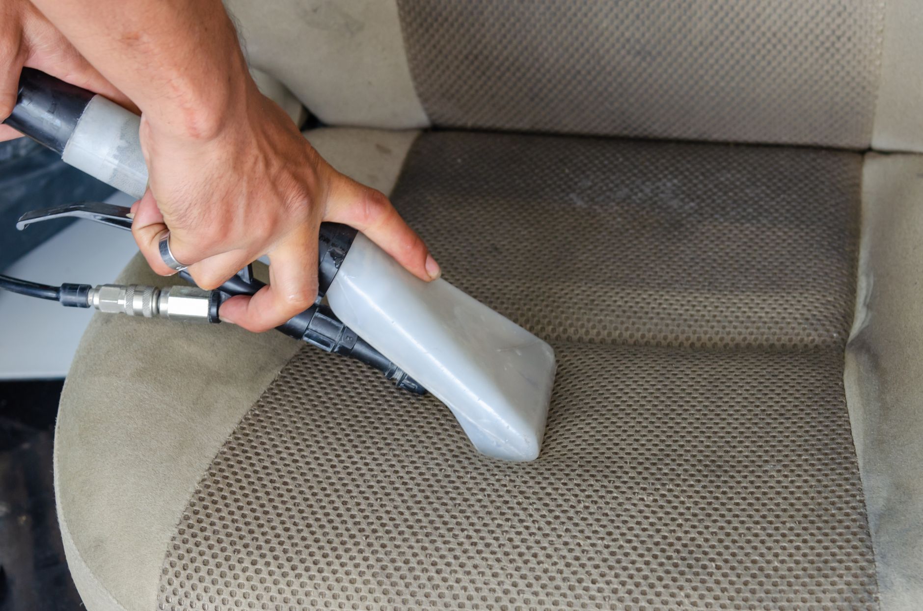 Vacuuming the inside of a car