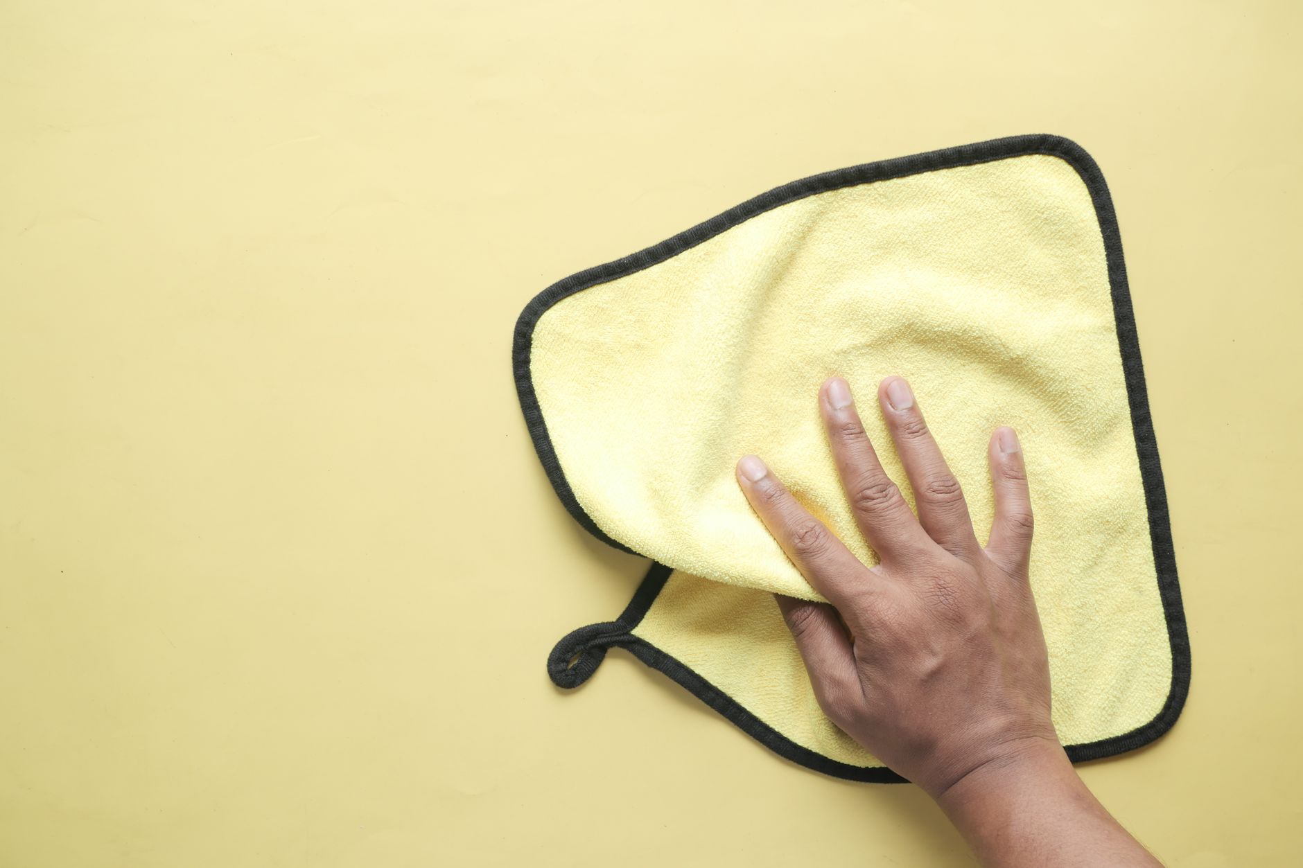 A soft microfiber towel for buffing wax