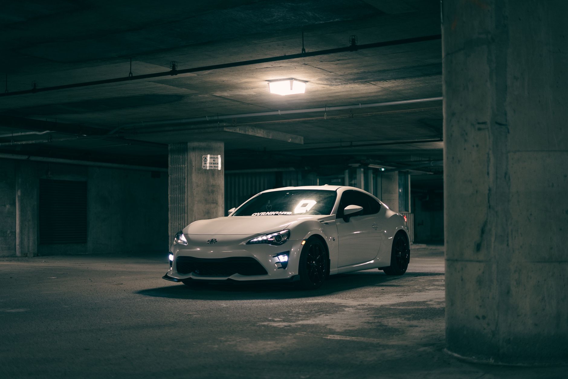 A car parked inside a home garage