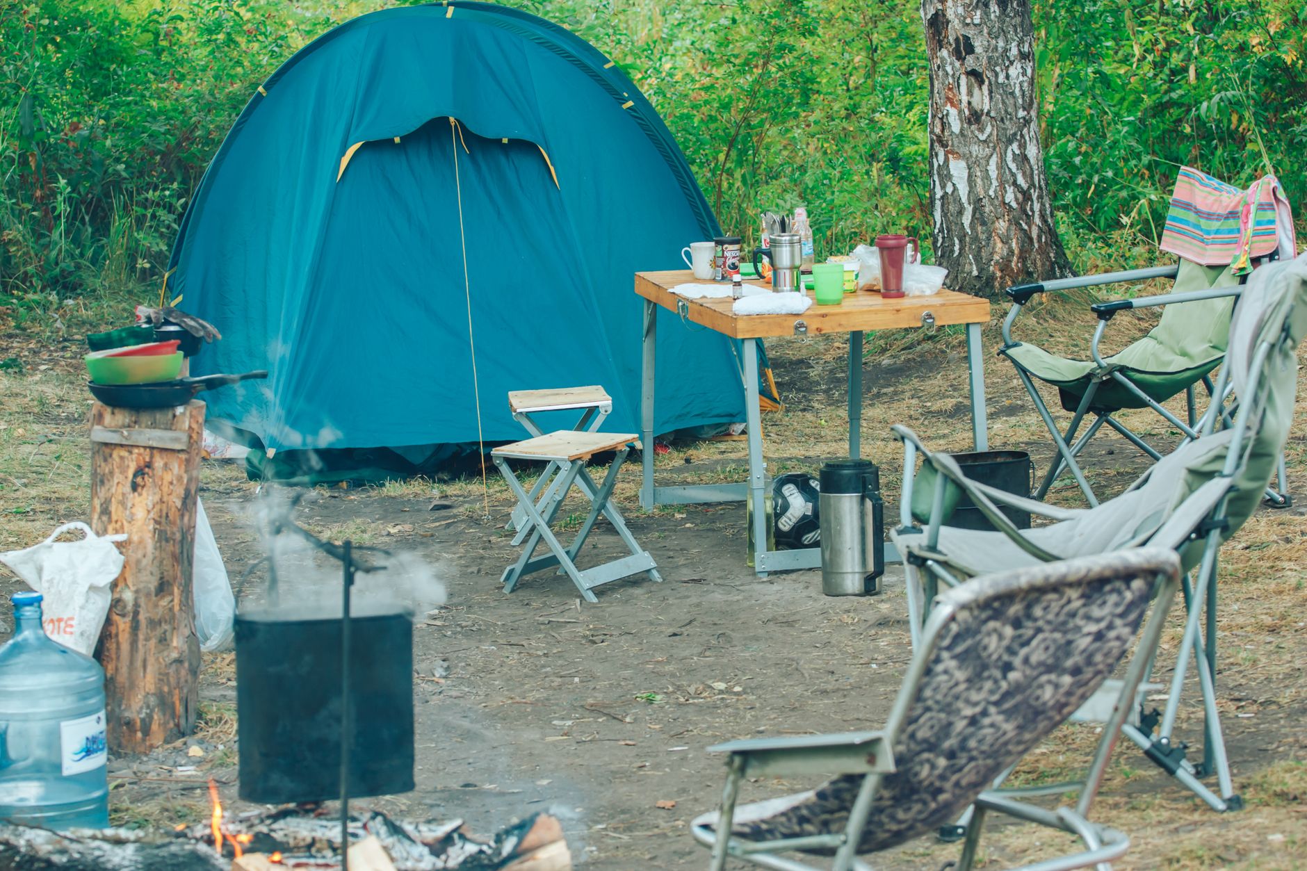 Camping gear laid out outdoors