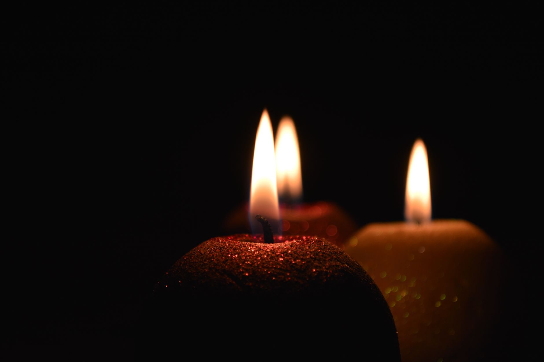 A lit candle flame