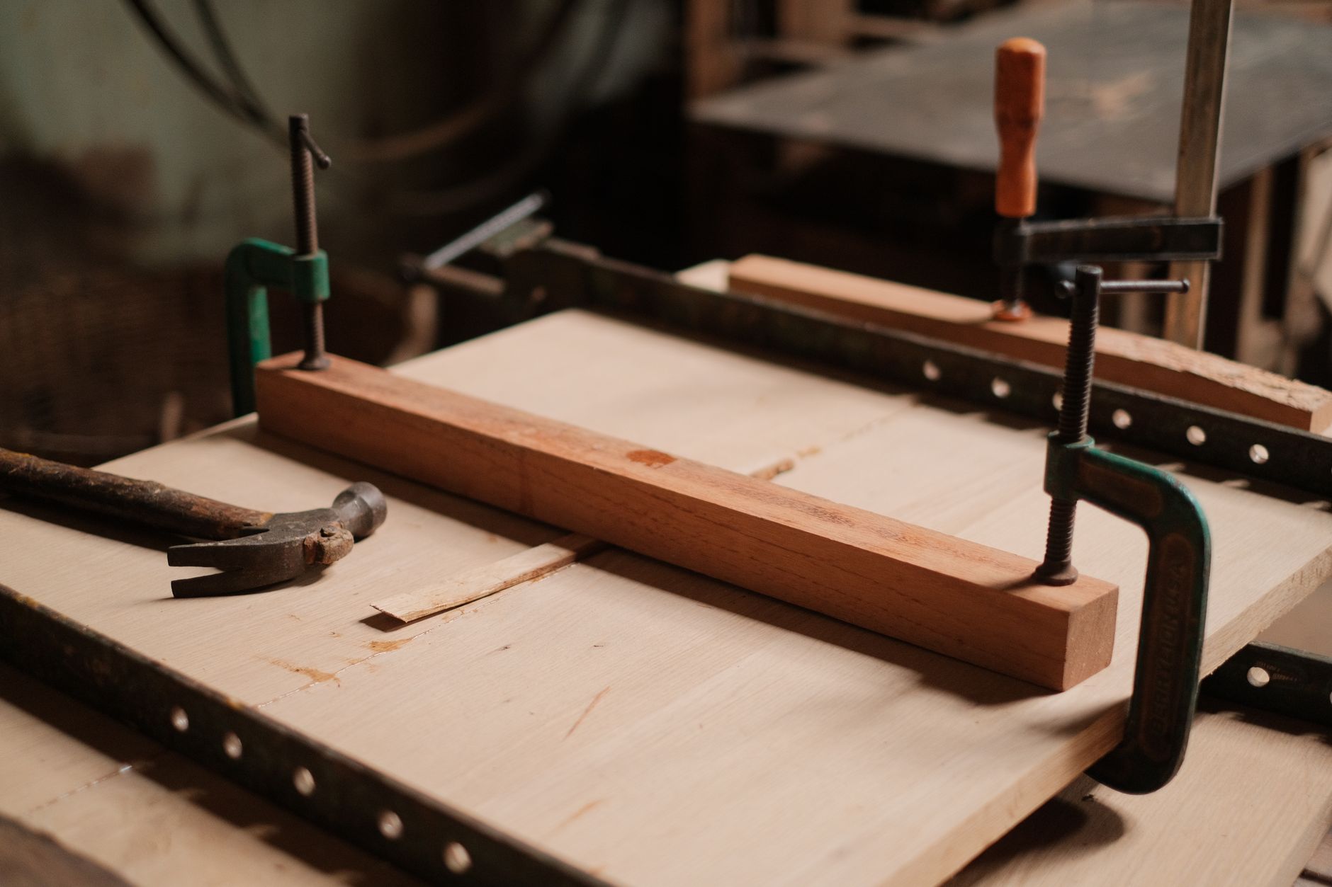 Clamps holding a woodworking glue-up