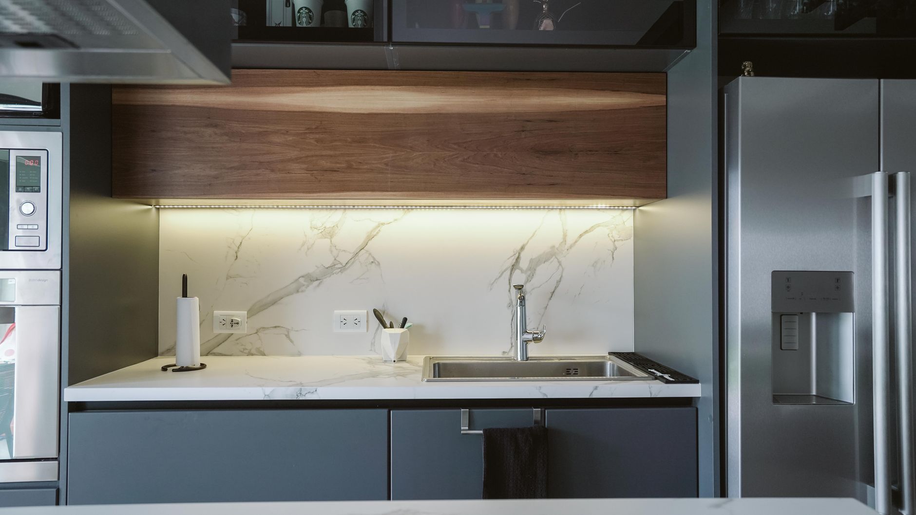 Kitchen cabinets above a counter and sink