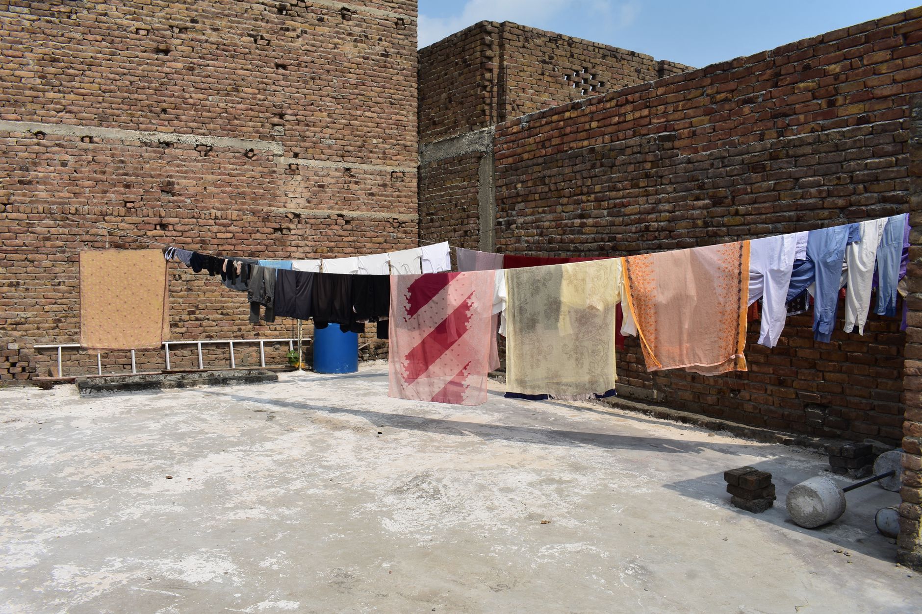 Laundry drying on a rooftop line