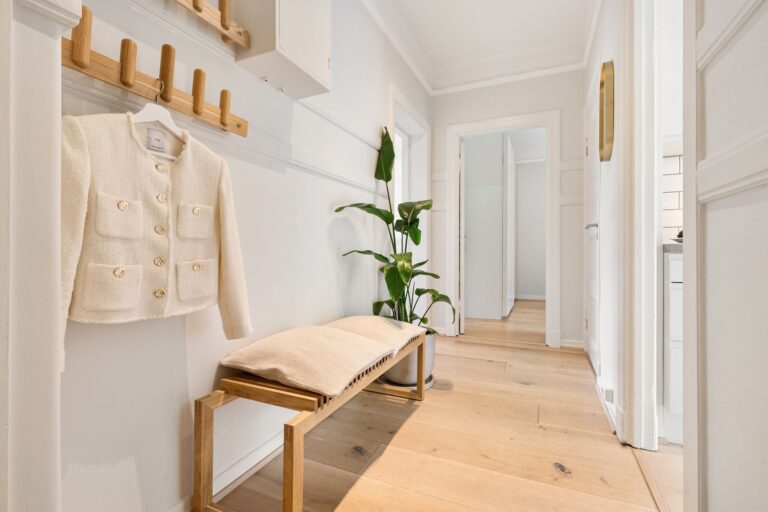 Best coat rack: coats hanging in a home entryway