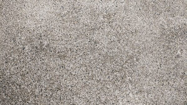 Best concrete grinder: a speckled concrete surface